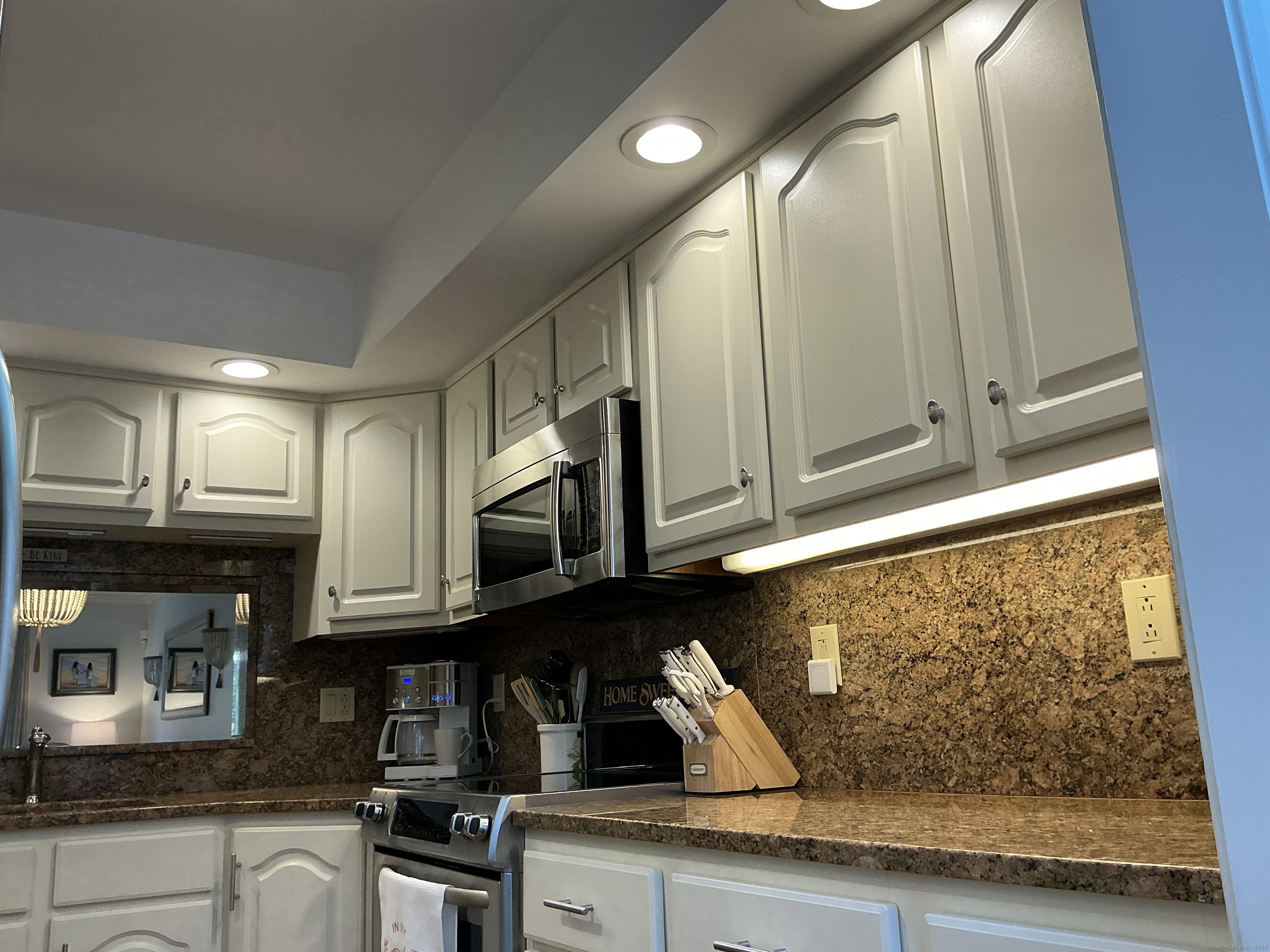 751 Long Hill Road, Unit C Middletown, CT 06457 - Photo 6 of 30 a kitchen with stainless steel appliances granite countertop a sink a stove and cabinets