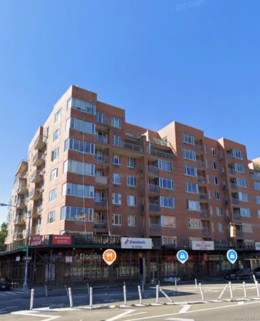 a front view of a building with street view