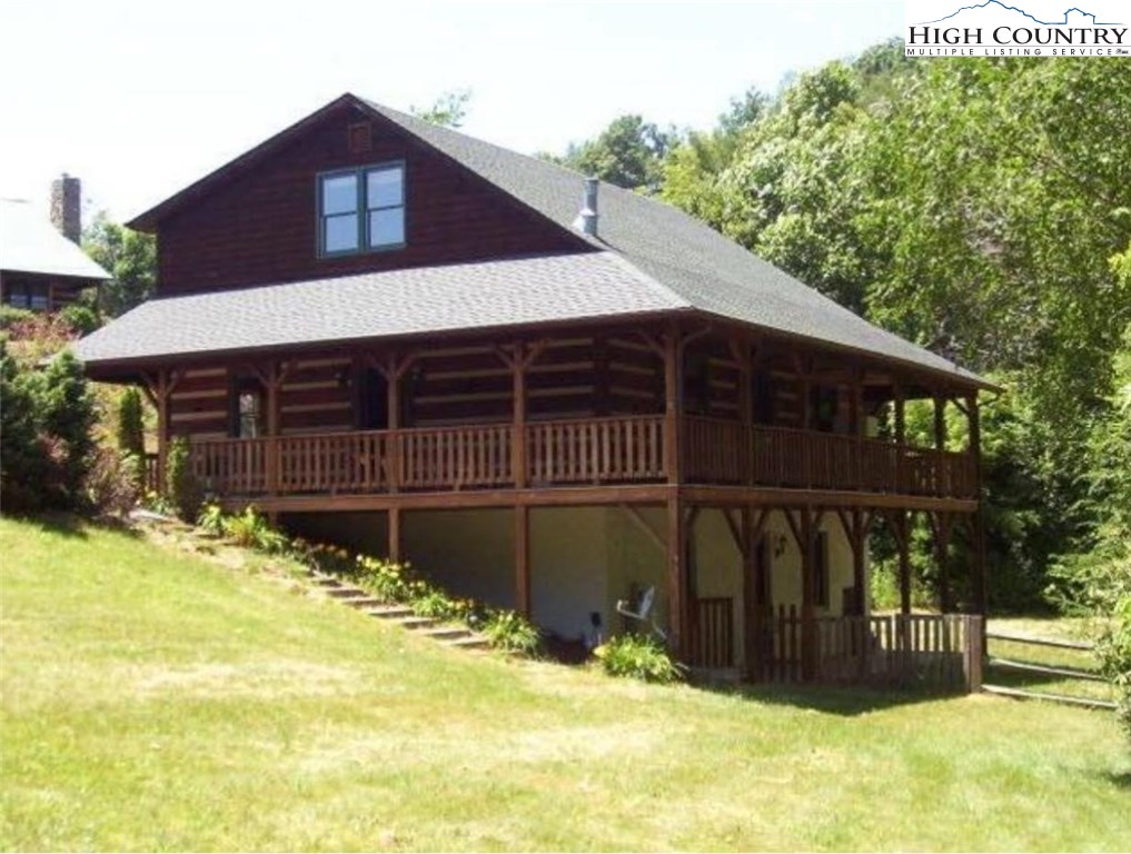146 Quick Boone, NC 28607 - Photo 1 of 22 a view of house with yard