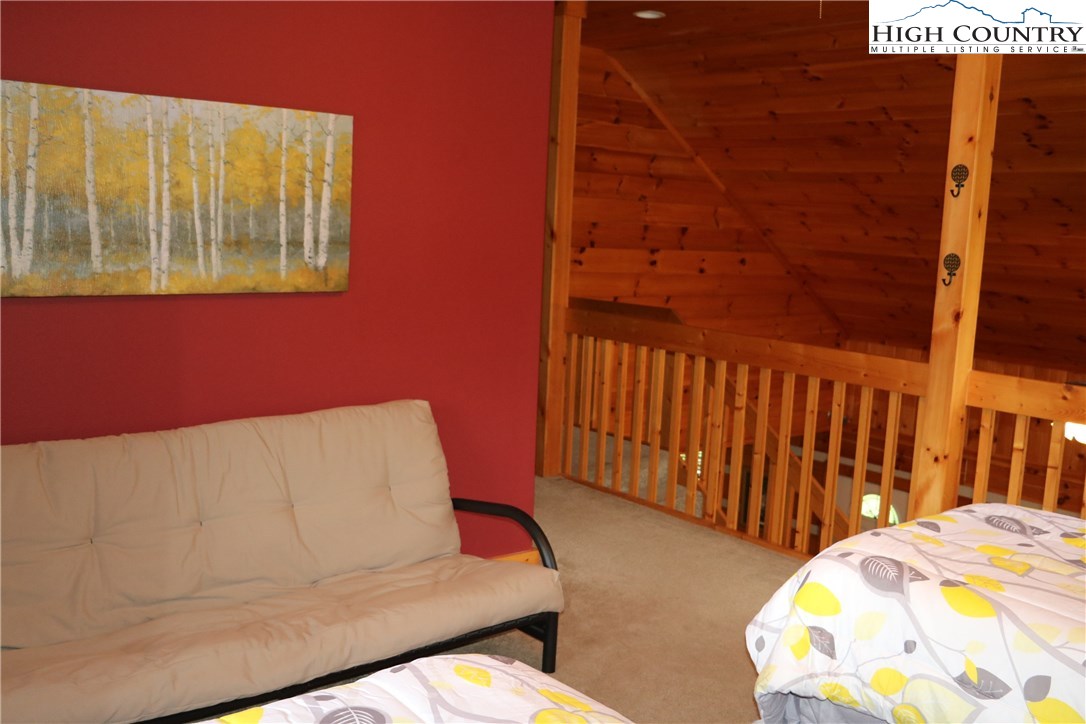 146 Quick Boone, NC 28607 - Photo 13 of 22 a bedroom with bed and a window