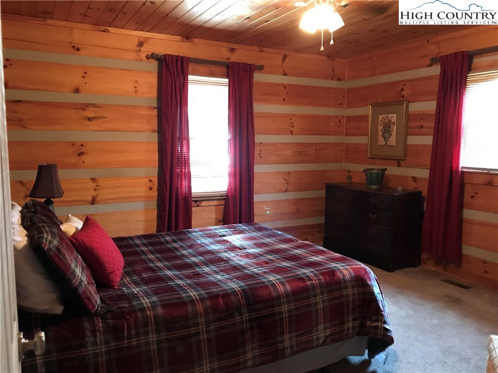 146 Quick Boone, NC 28607 - Photo 15 of 22 a bedroom with a bed and a closet