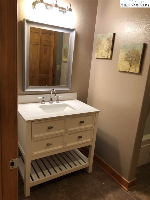 146 Quick Boone, NC 28607 - Photo 18 of 22 a bathroom with a sink and a mirror