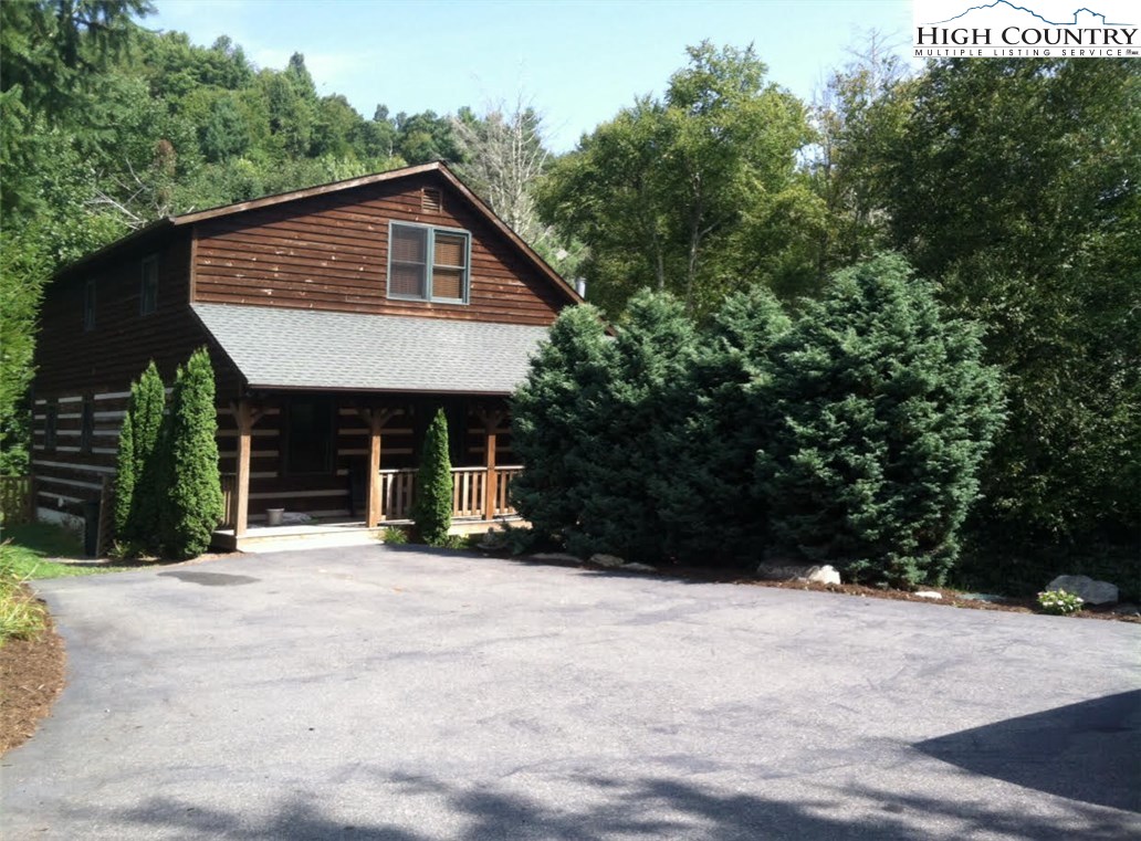 146 Quick Boone, NC 28607 - Photo 3 of 22 a view of a house with a outdoor space