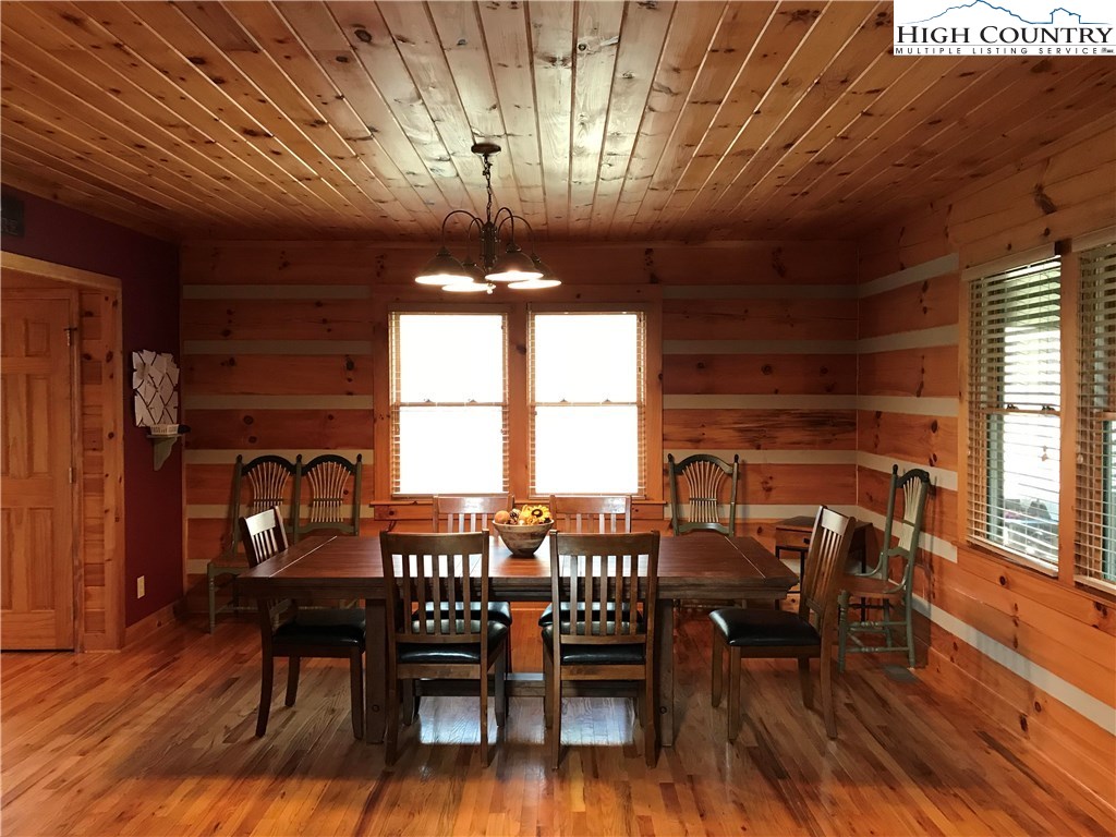 146 Quick Boone, NC 28607 - Photo 9 of 22 a view of a dining room with furniture window and wooden floor