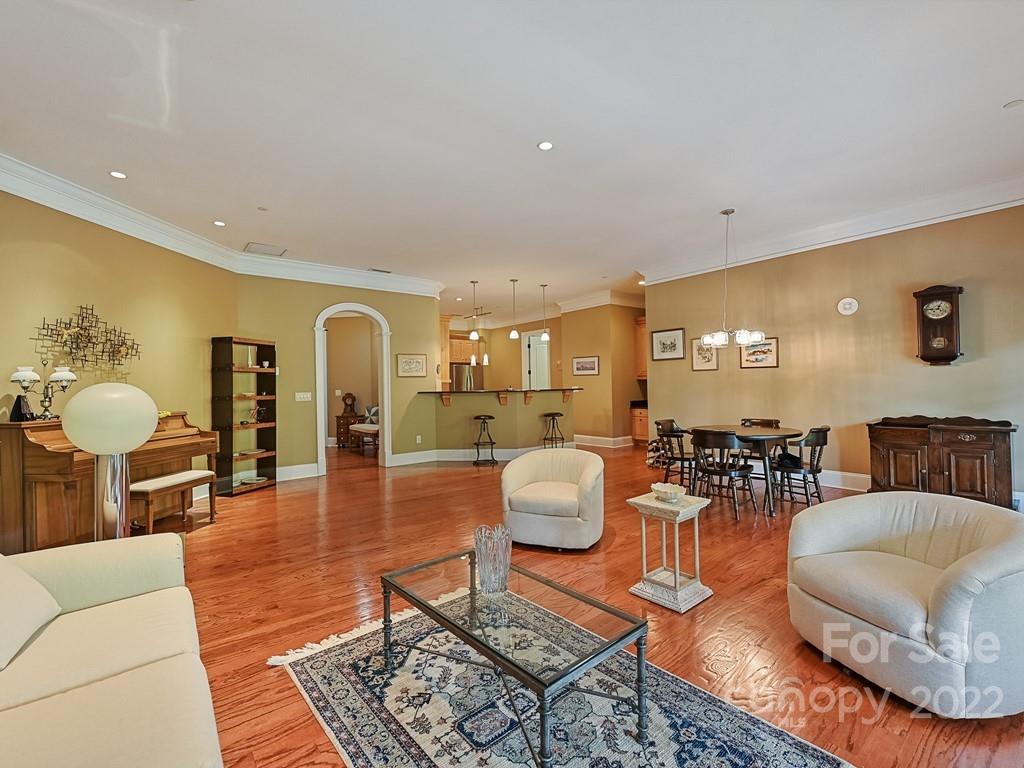2823 Providence Road, Unit 133 Charlotte, NC 28211 - Photo 11 of 43 a living room with furniture and wooden floor