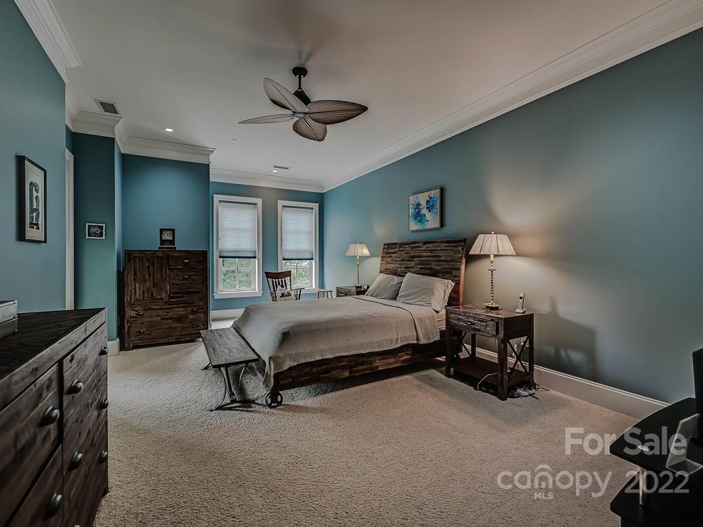 2823 Providence Road, Unit 133 Charlotte, NC 28211 - Photo 19 of 43 a bedroom with a bed and furniture
