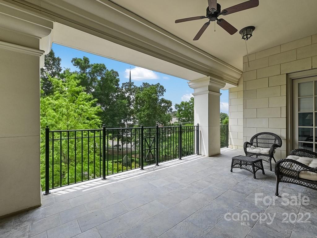 2823 Providence Road, Unit 133 Charlotte, NC 28211 - Photo 28 of 43 a view of a balcony with chairs