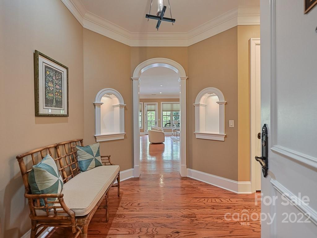 2823 Providence Road, Unit 133 Charlotte, NC 28211 - Photo 3 of 43 a view of a livingroom with furniture wooden floor and a rug