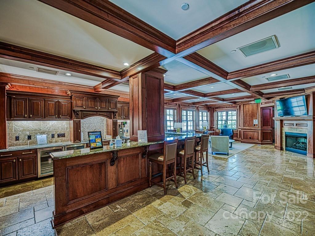 2823 Providence Road, Unit 133 Charlotte, NC 28211 - Photo 39 of 43 a kitchen with lots of counter top space and dining table
