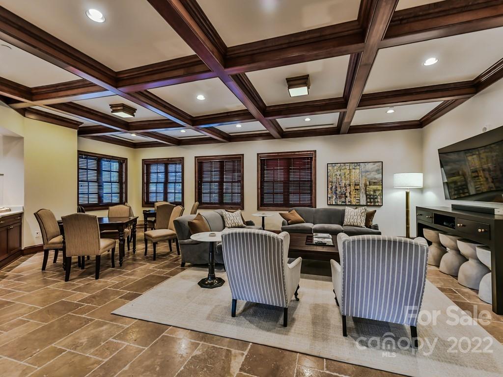 2823 Providence Road, Unit 133 Charlotte, NC 28211 - Photo 40 of 43 a living room with furniture and flat screen tv