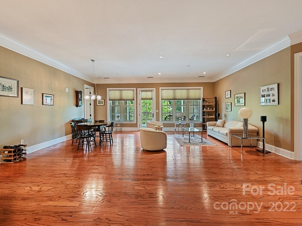 2823 Providence Road, Unit 133 Charlotte, NC 28211 - Photo 6 of 43 a living room with furniture and a large window