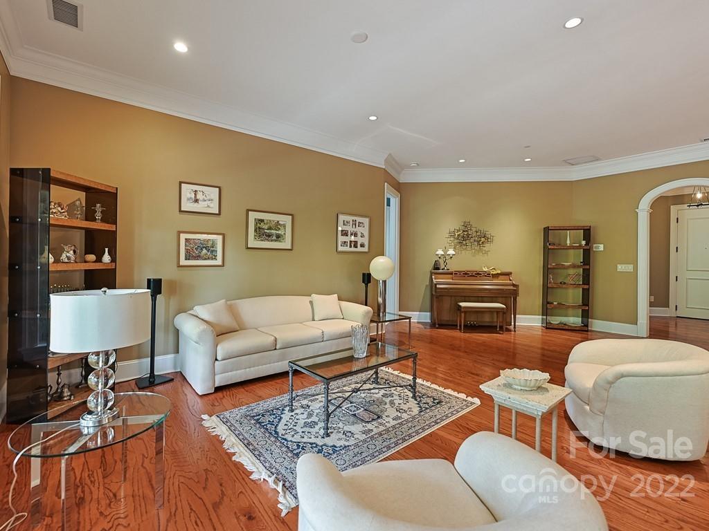 2823 Providence Road, Unit 133 Charlotte, NC 28211 - Photo 9 of 43 a living room with furniture and wooden floor