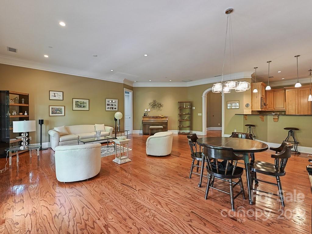 2823 Providence Road, Unit 133 Charlotte, NC 28211 - Photo 10 of 43 a living room with furniture and wooden floor