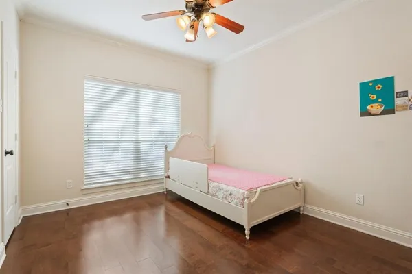 a room with a bed and a window