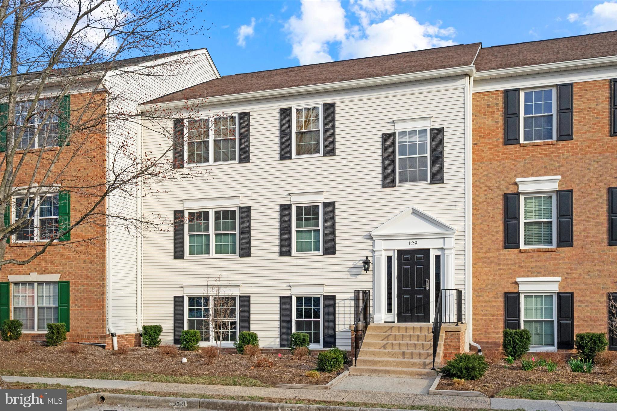 129 Fort Evans Road Southeast, Unit A Leesburg, VA 20175 - Photo 1 of 33 a front view of a building