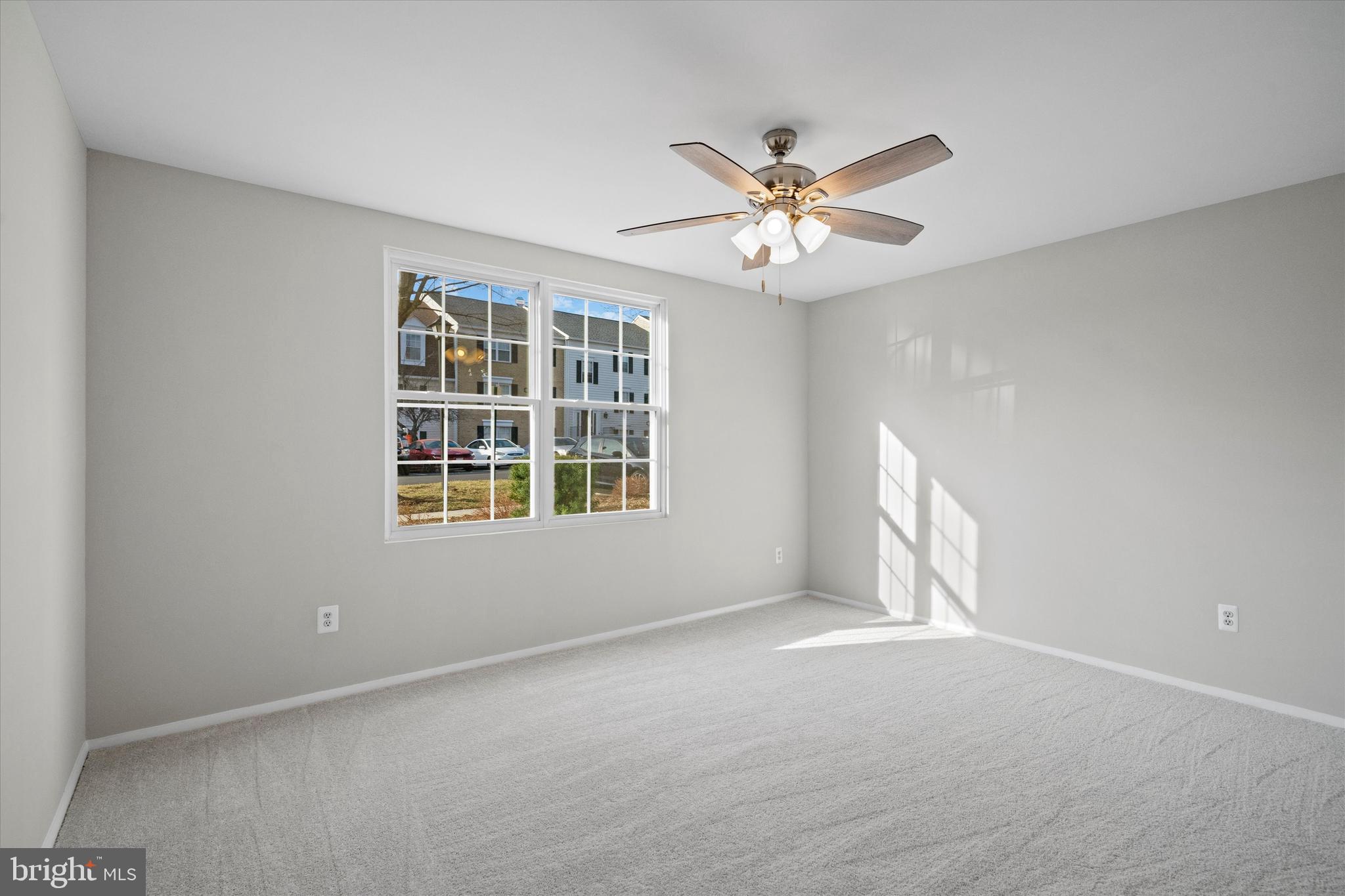 129 Fort Evans Road Southeast, Unit A Leesburg, VA 20175 - Photo 17 of 33 a view of an empty room with a window