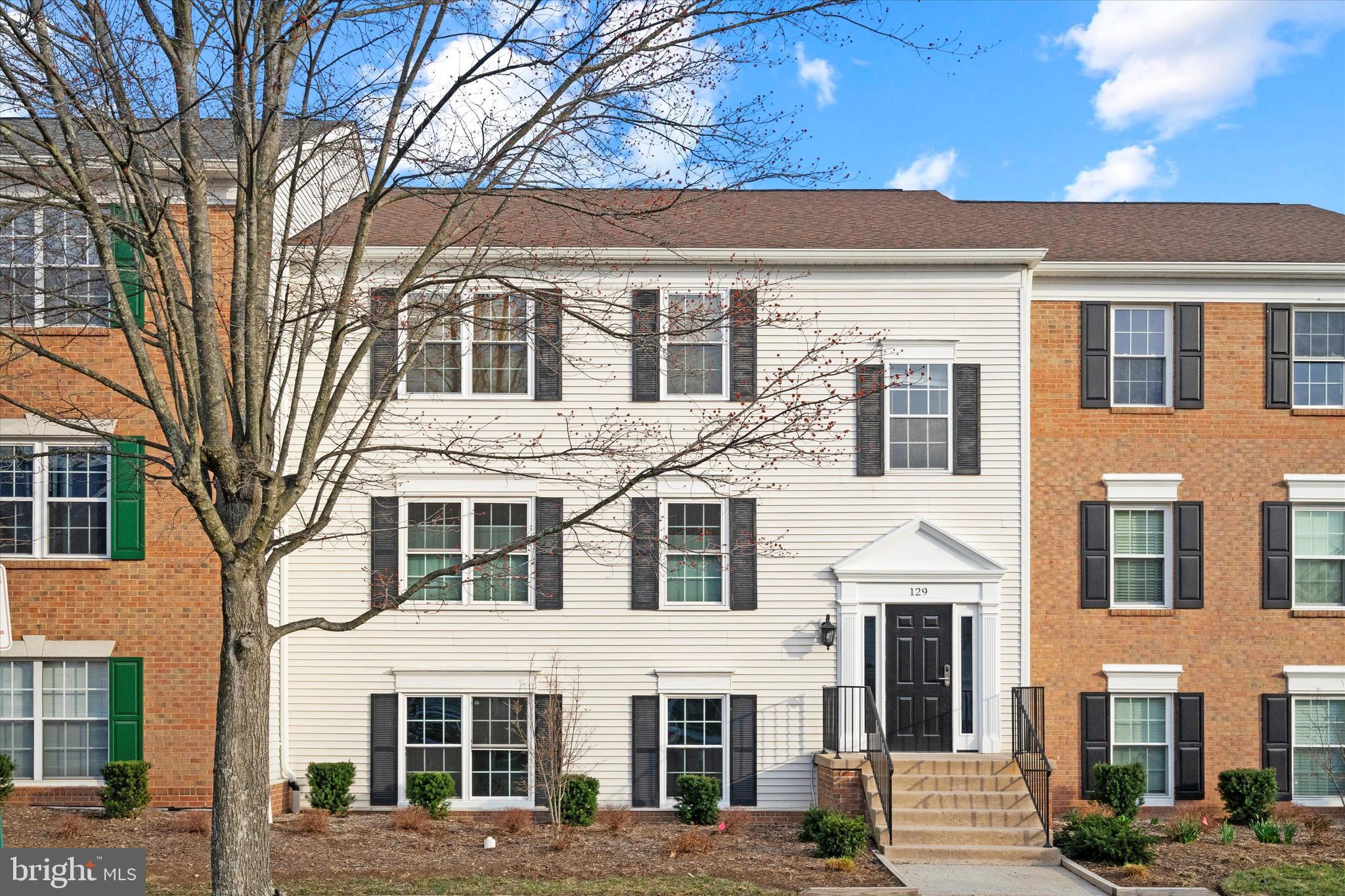 129 Fort Evans Road Southeast, Unit A Leesburg, VA 20175 - Photo 2 of 33 a front view of a building with street view