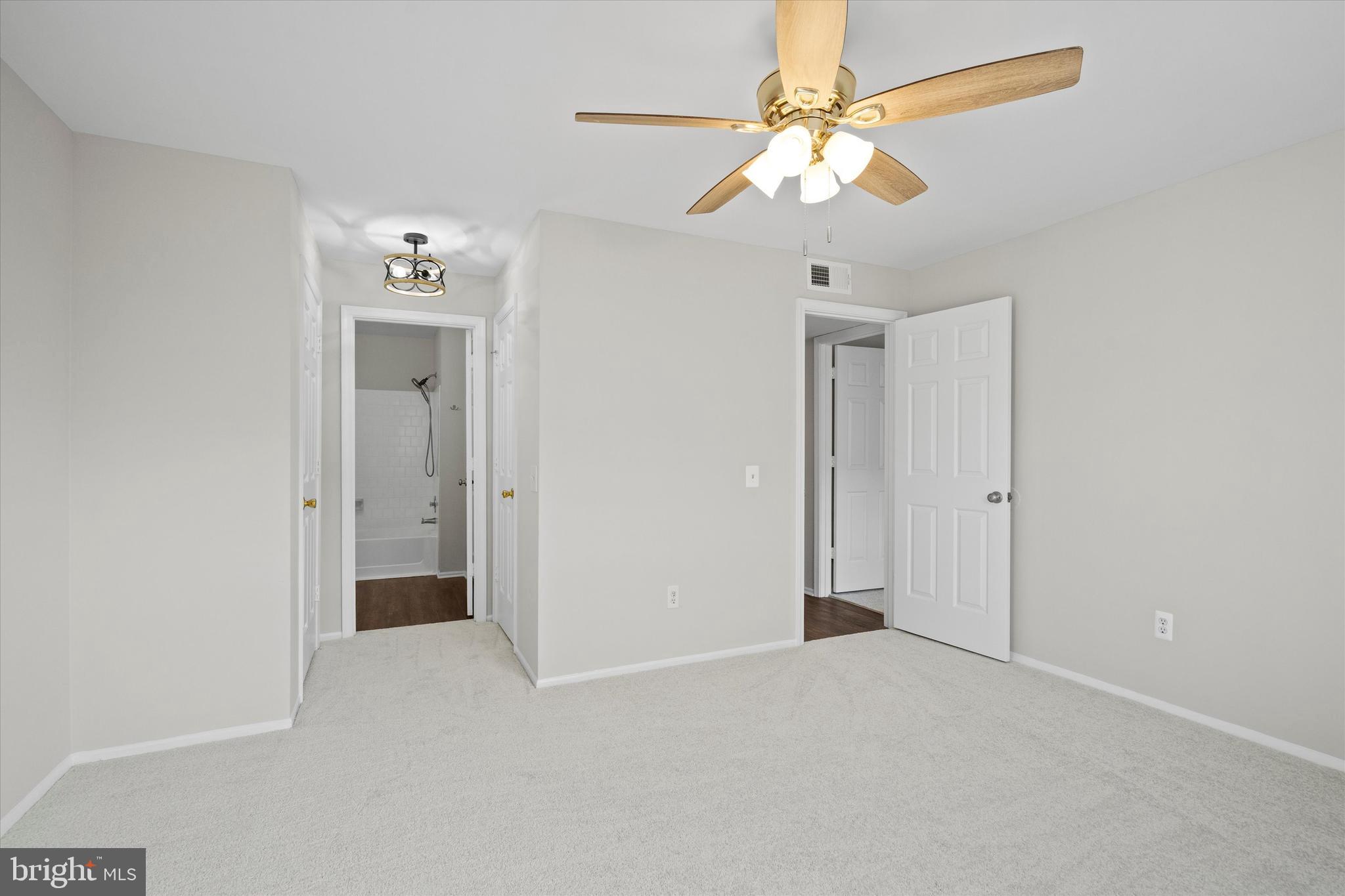 129 Fort Evans Road Southeast, Unit A Leesburg, VA 20175 - Photo 22 of 33 wooden floor in an empty room