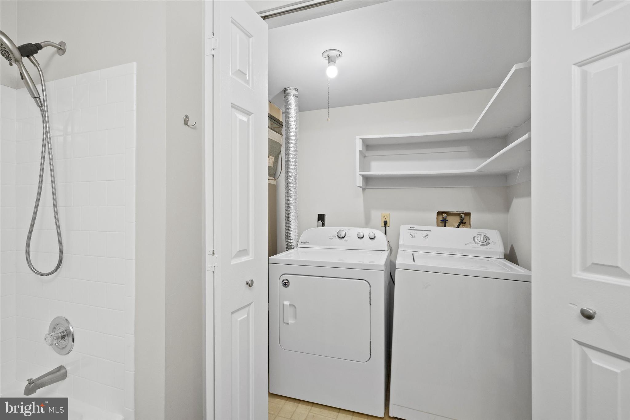 129 Fort Evans Road Southeast, Unit A Leesburg, VA 20175 - Photo 25 of 33 a utility room with dryer and washer