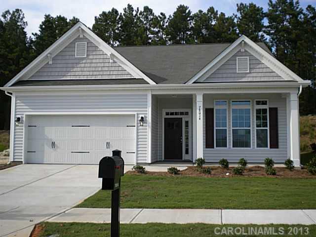 78014 Rillstone Drive, Unit 184 Lancaster, SC 29720 - Photo 1 of 16 a front view of a house with garden