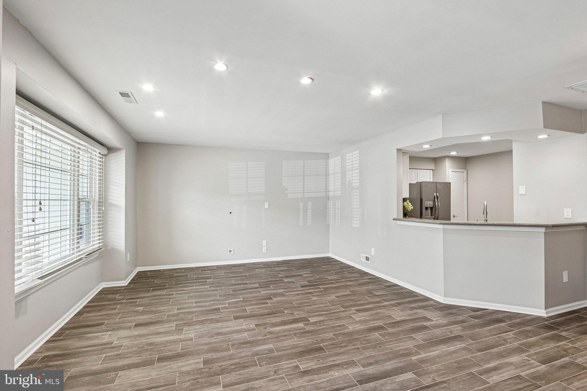 803 Wharton Road Mount Laurel, NJ 08054 - Photo 9 of 48 a view of empty room with wooden floor and fan