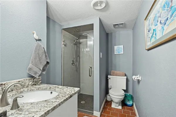 a bathroom with a sink and mirror