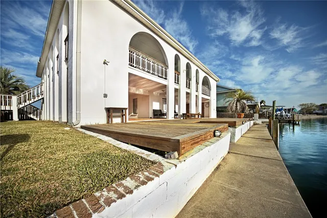 a view of a room with dining area and glass door