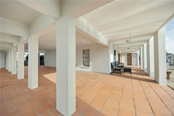 an aerial view of houses with outdoor space