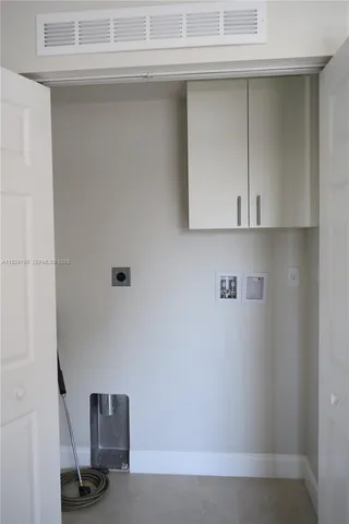 a bathroom with a sink toilet and vanity