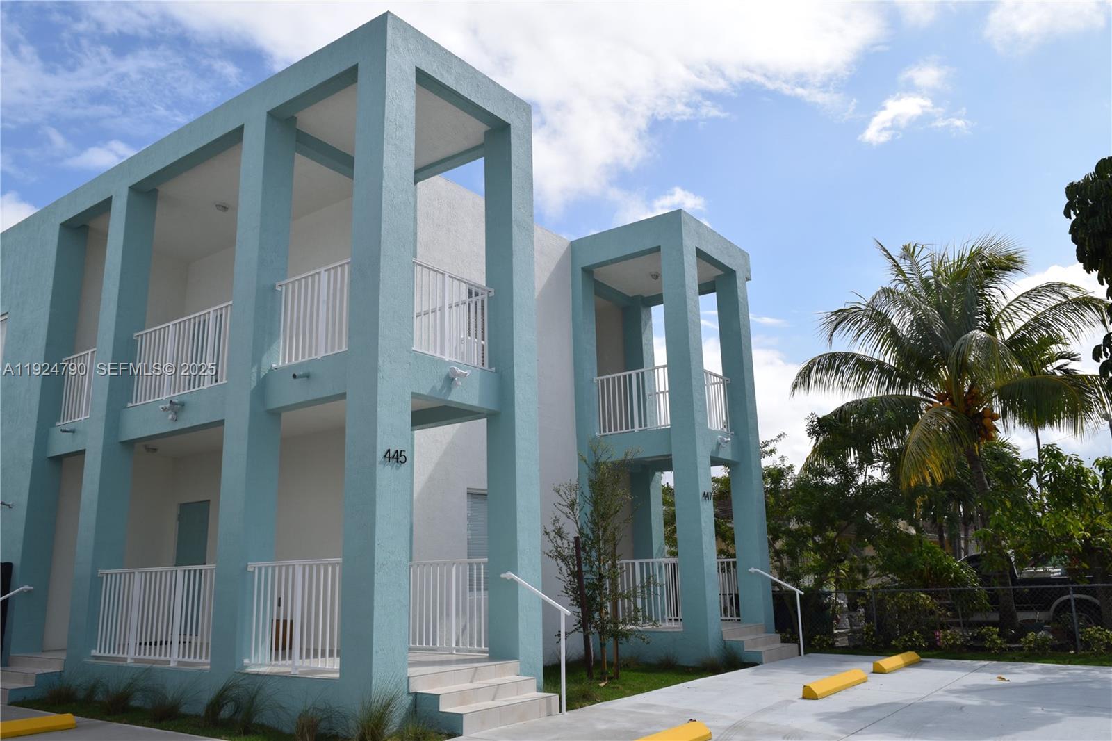 435 Southwest 78th Court Miami, FL 33144 - Photo 2 of 19 a palm tree in front of a building