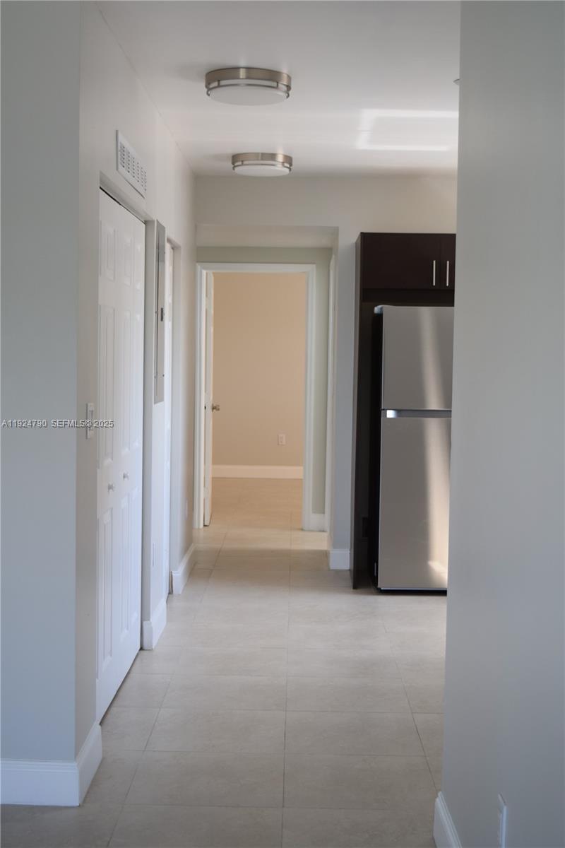 435 Southwest 78th Court Miami, FL 33144 - Photo 6 of 19 a view of a refrigerator in a kitchen