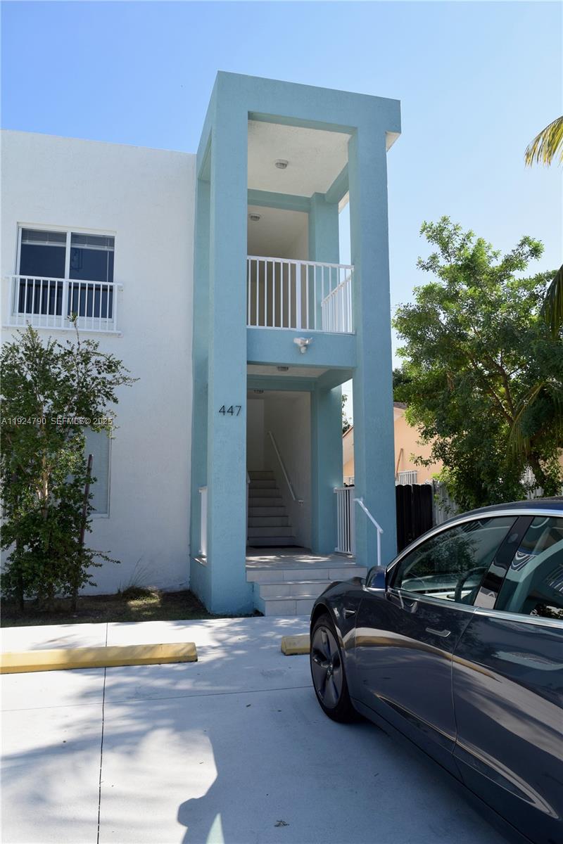 435 Southwest 78th Court Miami, FL 33144 - Photo 10 of 19 a car parked in front of a house