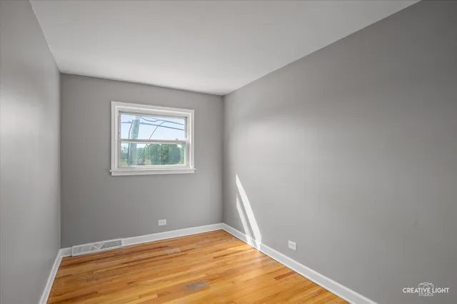 a view of an empty room with window