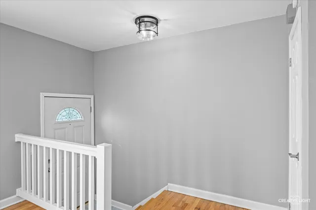 a view of a hallway with a window