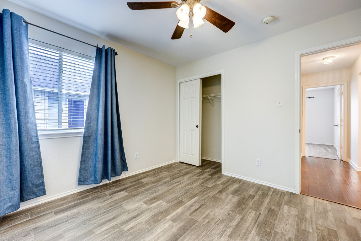 12017 Buzz Schneider Lane Austin, TX 78748 - Photo 8 of 11 a view of a livingroom with a staircase