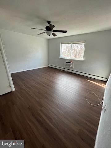 216 Boro Road, Unit A Secane, PA 19018 - Photo 7 of 26 an empty room with wooden floor fan and windows