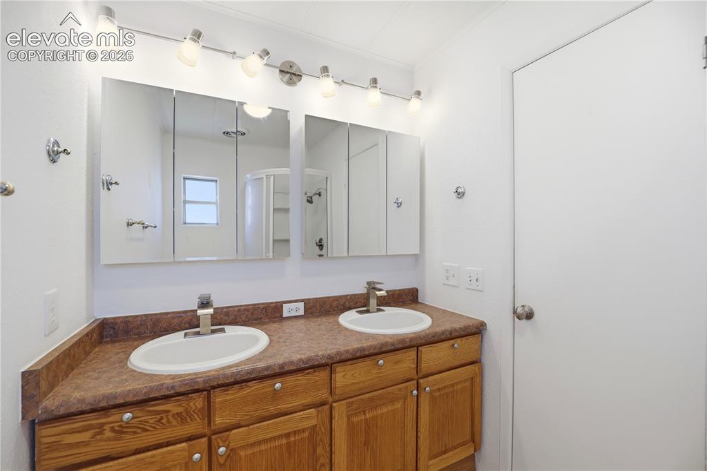 19027 Murphy Road Peyton, CO 80831 - Photo 21 of 48 Free Standing Shower, Jack And Jill Sinks