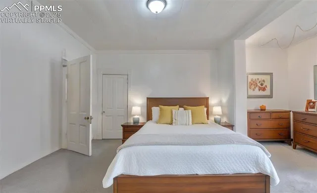 a living room with furniture and a piano