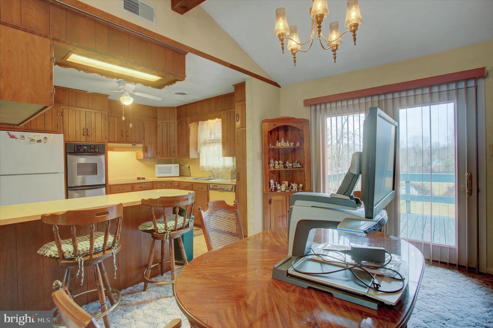 10839 Old Forge Road Waynesboro, PA 17268 - Photo 11 of 48 a living room with furniture and a chandelier