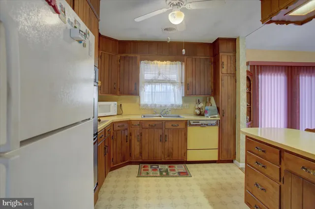 a room with cabinets and window