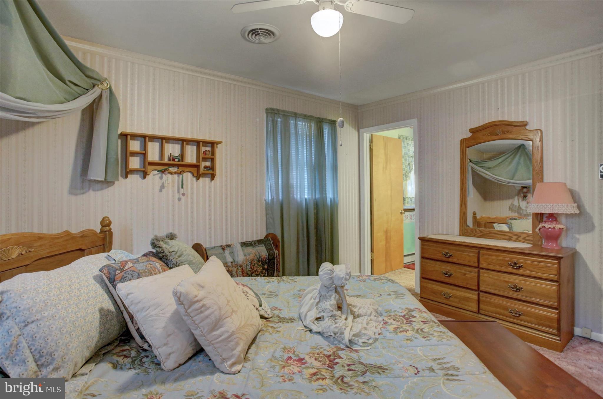10839 Old Forge Road Waynesboro, PA 17268 - Photo 23 of 48 a bedroom with a bed and a dresser