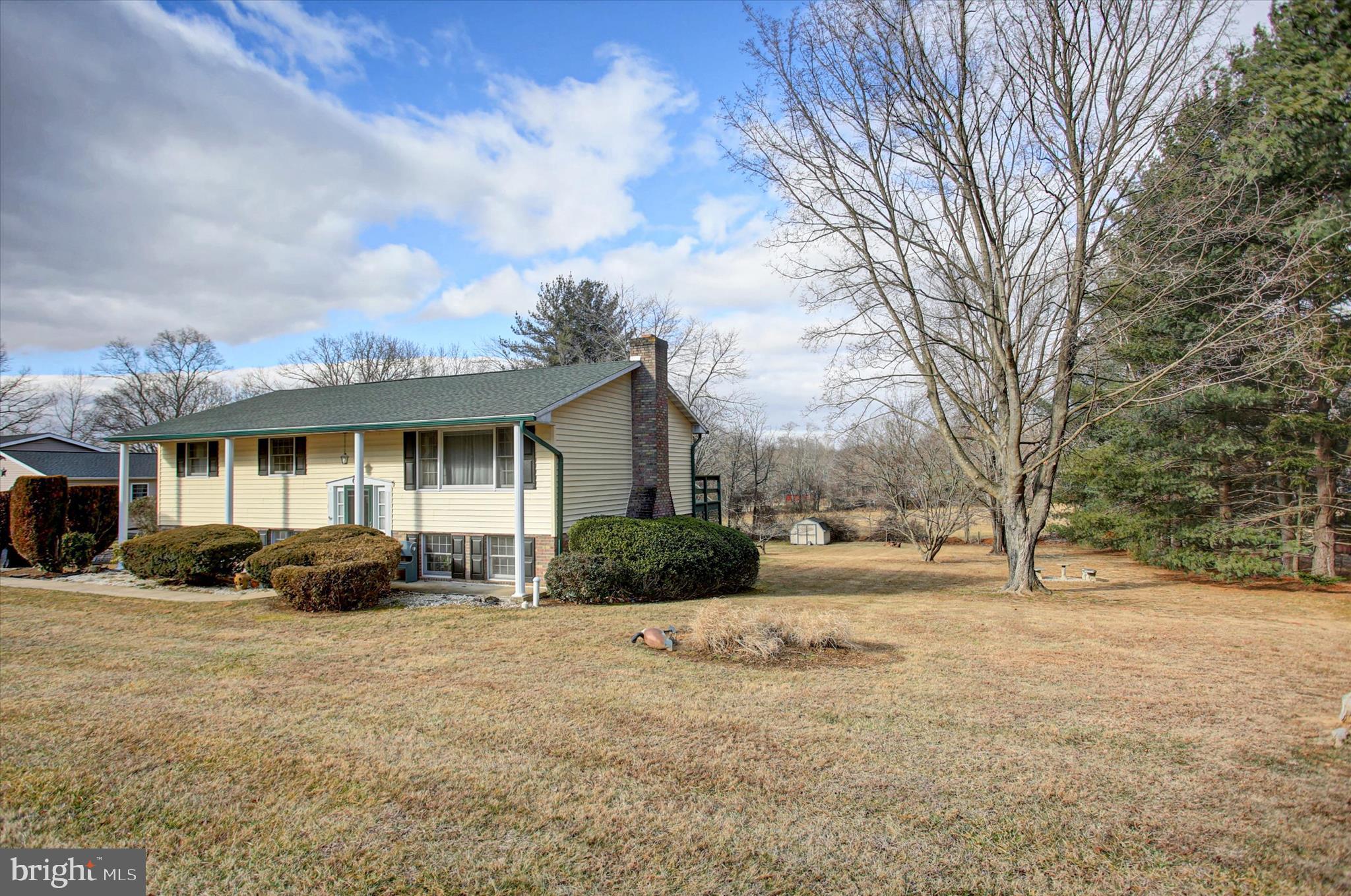 10839 Old Forge Road Waynesboro, PA 17268 - Photo 3 of 48 a front view of a house with a yard