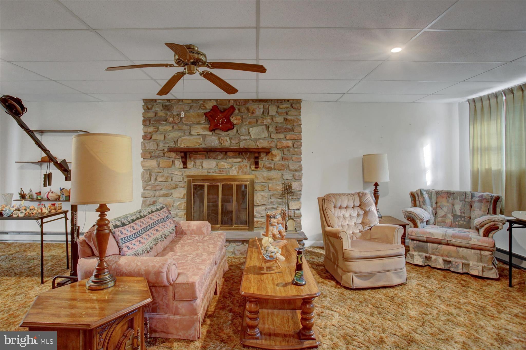 10839 Old Forge Road Waynesboro, PA 17268 - Photo 34 of 48 a living room with furniture and a fireplace