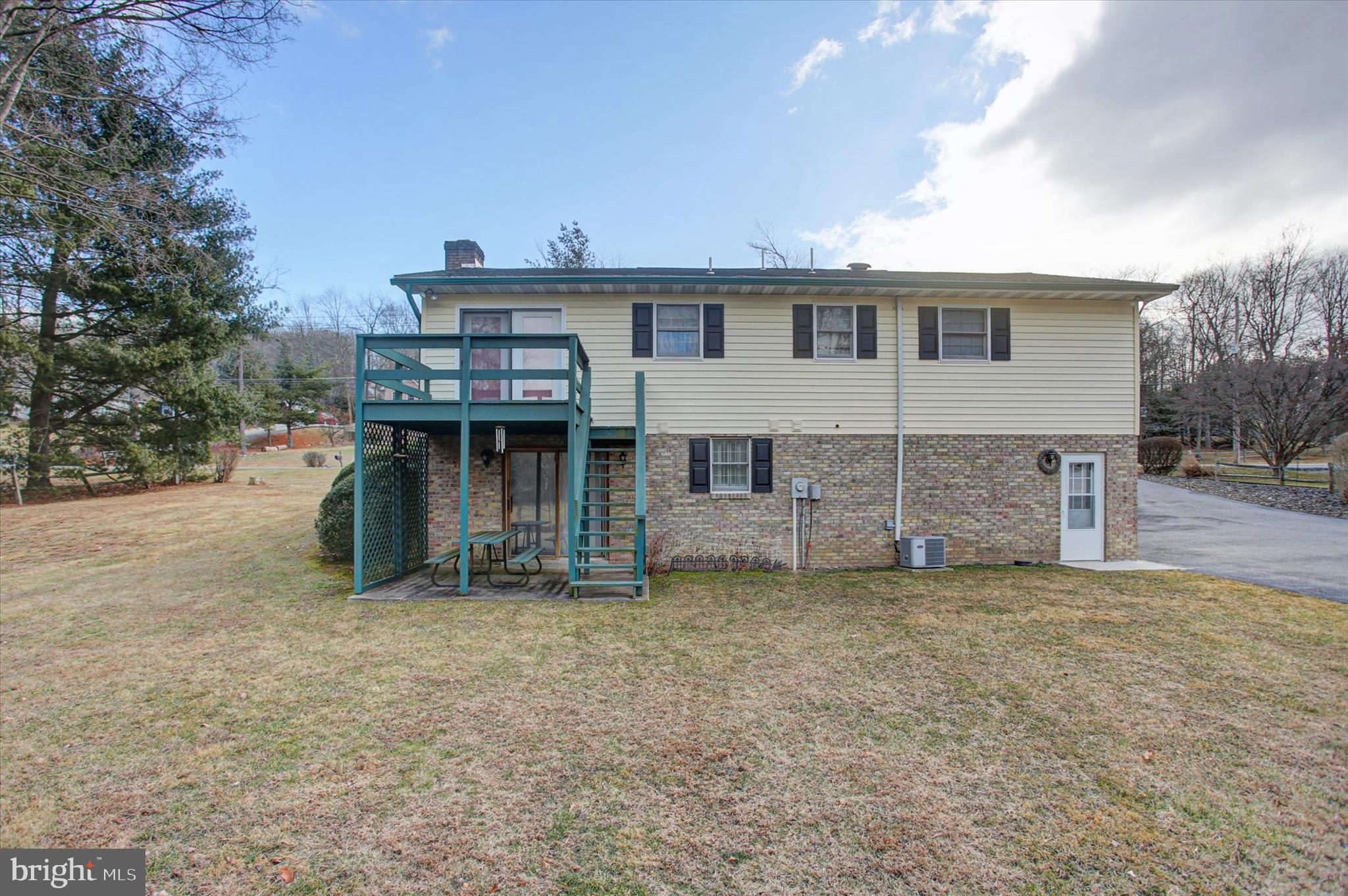 10839 Old Forge Road Waynesboro, PA 17268 - Photo 45 of 48 a view of a house with a yard and sitting area