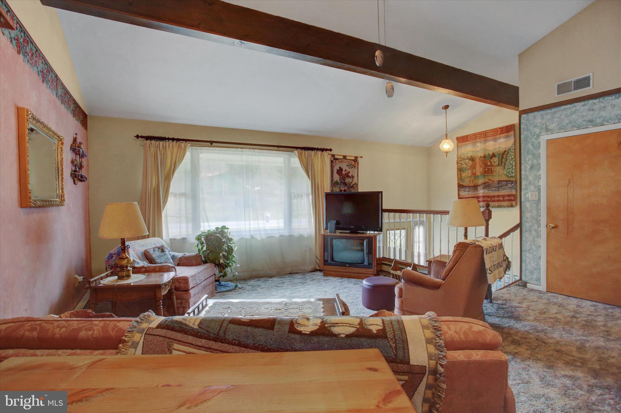 10839 Old Forge Road Waynesboro, PA 17268 - Photo 9 of 48 a living room with furniture rug and a large window