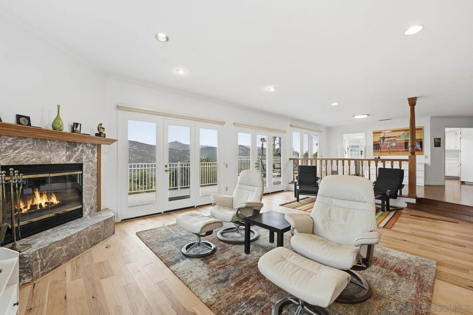 3132 Don Rolando Escondido, CA 92025 - Photo 13 of 34 a living room with furniture and a fireplace