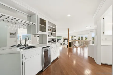 a kitchen with stainless steel appliances granite countertop a sink and cabinets