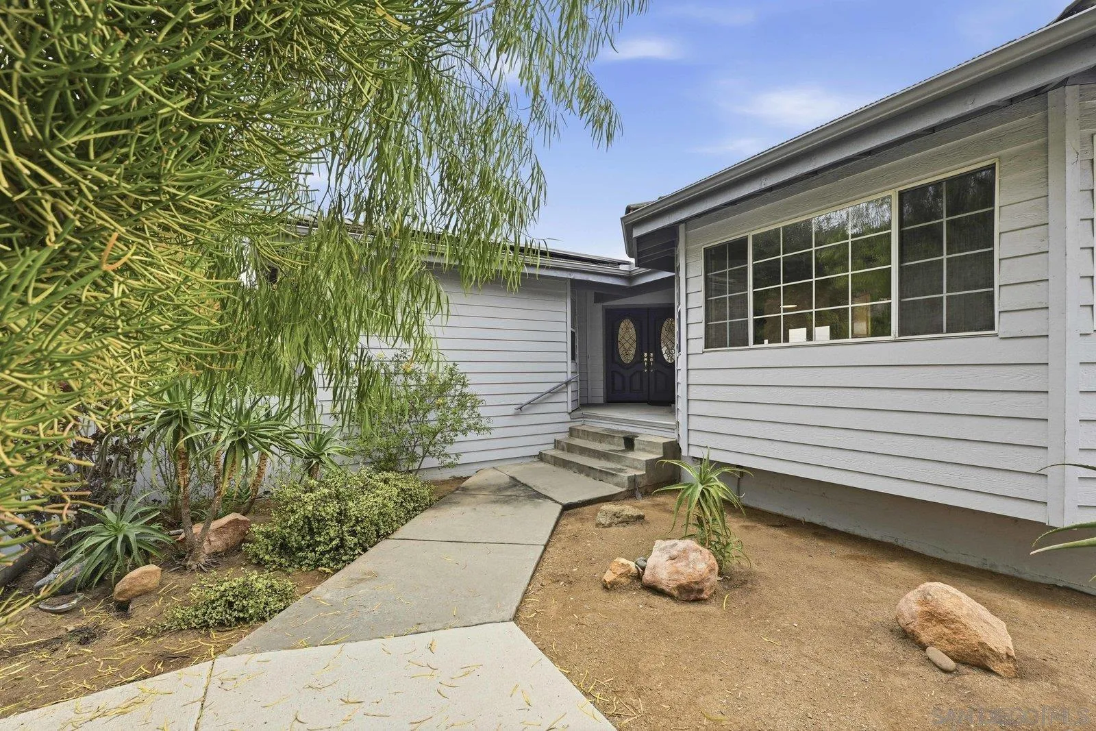 3132 Don Rolando Escondido, CA 92025 - Photo 4 of 47 a backyard of a house with seating space