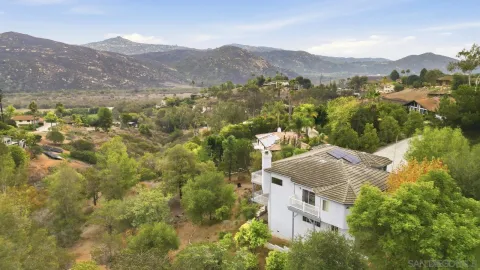 a view of mountain view with mountains in the background