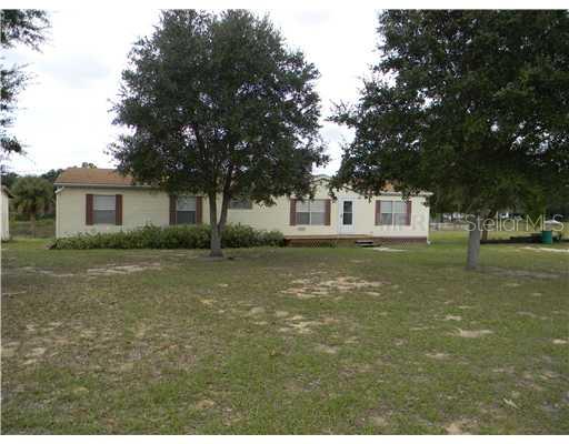 11035 South Em En El Grove Road Leesburg, FL 34788 - Photo 1 of 1 Exterior Front